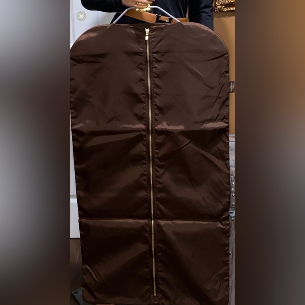 Authentic Louis Vuitton garment cover bag with 1 hanger in new condition.